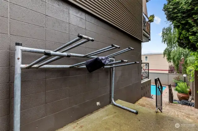 Community bike rack at entrance of pool area