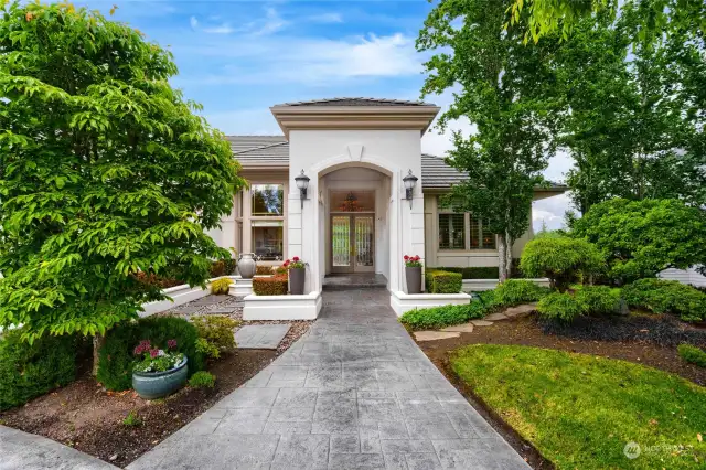 Front entry features a beautiful stamped concrete walkway. Courtyard features stepping stones that lead to private fountain area. Enjoy views of the courtyard and the peaceful sound of the water fountain from inside the front office.