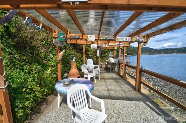 Lots of room for entertaining just off the bulkhead and easy steps to the beach