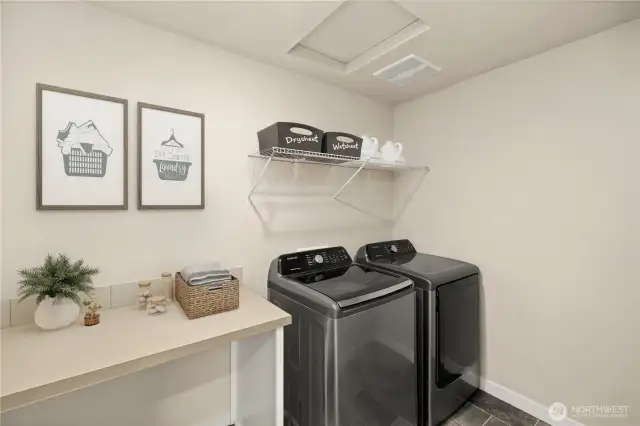 Plenty of practical space in the laundry room.                                                                          virtually staged