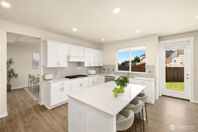 Light and bright, plenty of space for cooks, eager assistants and guests alike.                          virtually staged