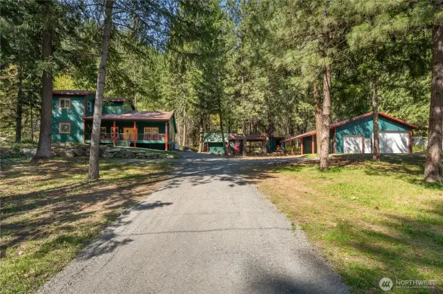Welcome Home! This beautiful custom built home offers everything and room for your toys.  The HUGE shop is a bonus with a wood stove, work bench's and 3/4 bath. You are minutes to Leavenworth and Wenatchee yet tranquil time stands still here.  Enjoy the visits from deer, elk, and wild turkeys to name just a few. Cozy up to your river rock fireplace, enjoy time in the open concept kitchen, or watch the snow fall from your covered front porch.  All the season's offer their own joy.  Recreation is at your fingertips right outside your front door.