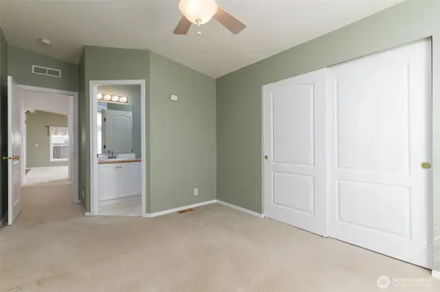 Primary bedroom with large closet and en suite