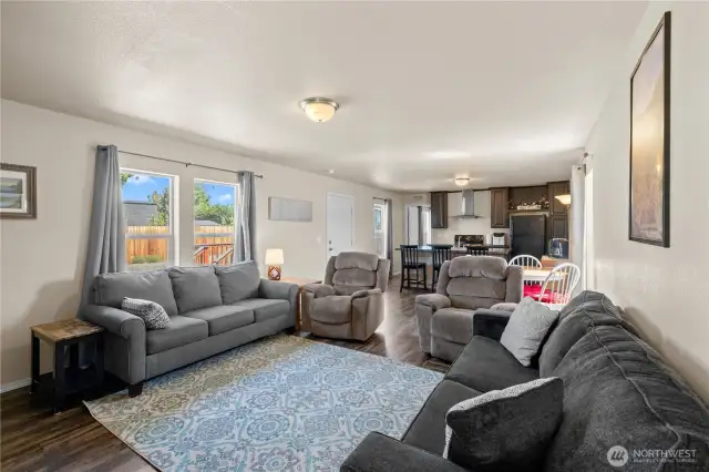Living room open to dinning room and kitchen.
