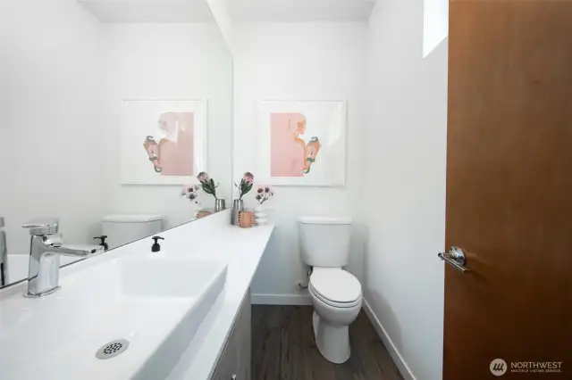 The thoughtfully designed guest bath enhances comfort and convenience, making it easy to host friends and family with style.