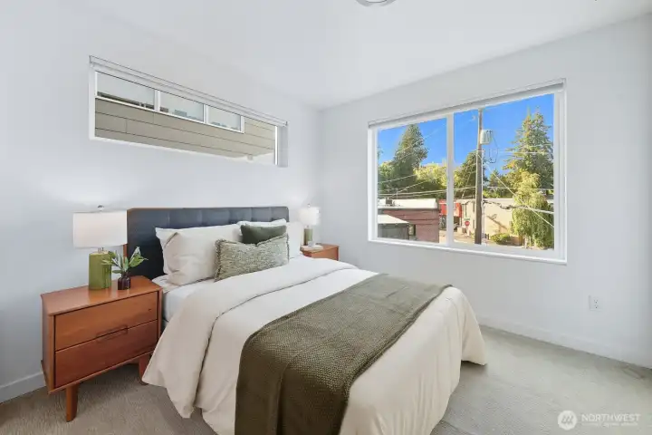 Second bedroom on upper level can also flex as office/den