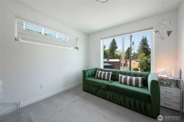 The guest bedroom offers versatile potential—ideal for hosting loved ones, creating a flex space, or bringing your unique vision to life.