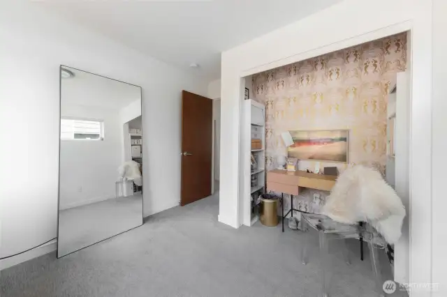 Perhaps a dedicated vanity area or additional storage? The possibilities are yours to explore in this flexible and inviting space.
