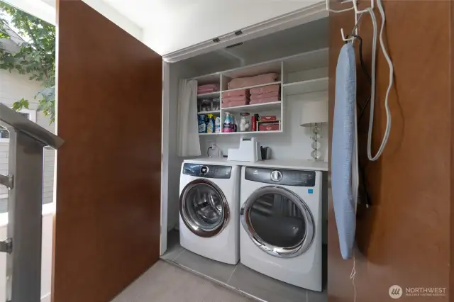 A conveniently located washer and dryer make daily routines a breeze.