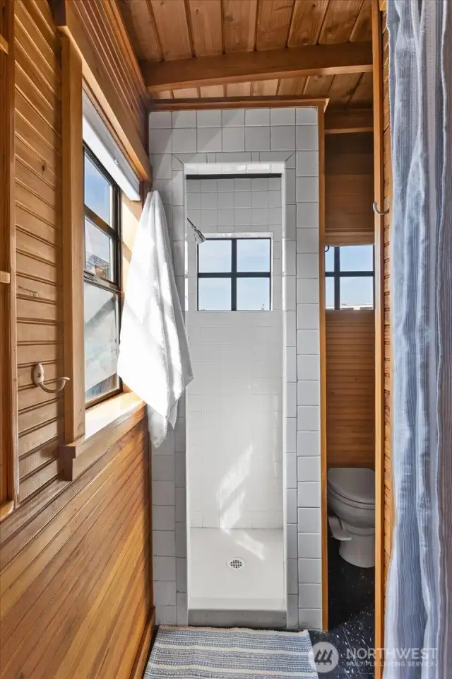Fully tiled shower with a window!