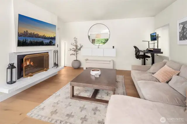 Living room with wood burning fireplace