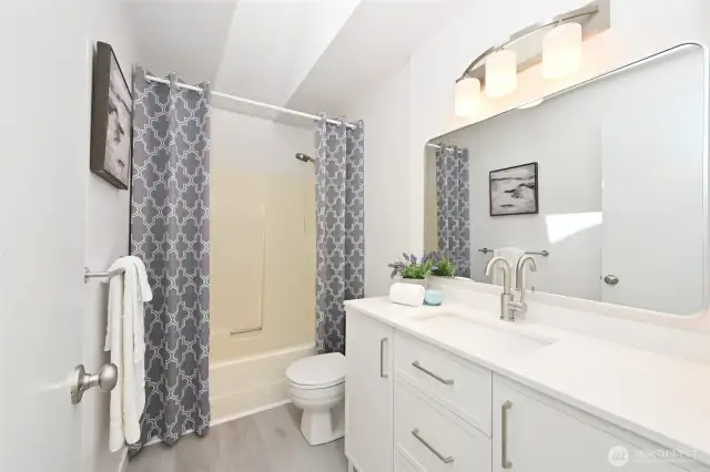 Large 2nd bath wt skylight, new vanity plus
