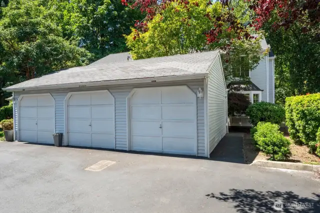 Entrance to right of garage