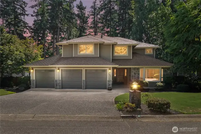 Where modern comfort and scenic beauty come together - backing to trails with views of Lake Wilderness.