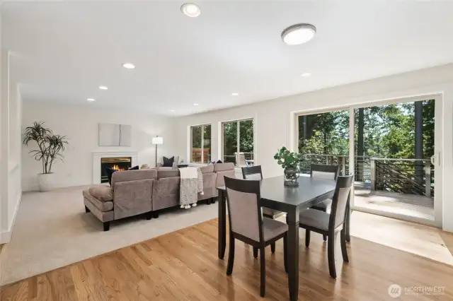 The breakfast nook and cozy family room overlook the lake and open to the deck for easy entertaining.