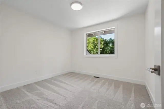 Every bedroom boasts fresh, new carpeting.