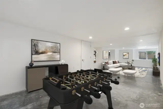 Accessible from the lower level exterior, this ultra-cool bonus space offers endless flexibility—perfect for entertaining, workouts, a wine cellar, private office, or whatever you envision.   This photo is virtually staged.