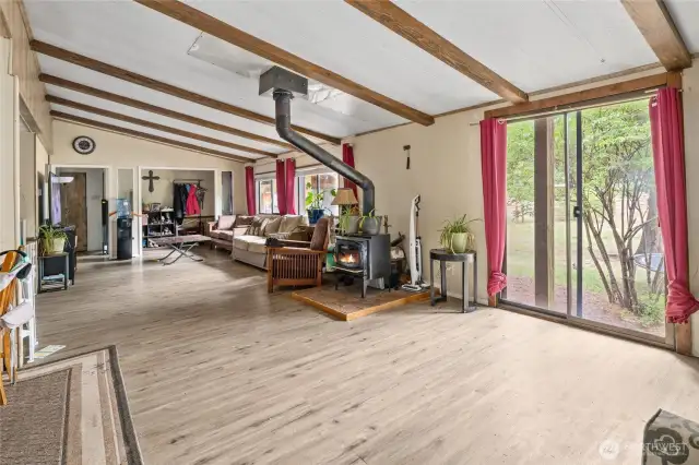 Large Great Room with a wood burning fireplace.
