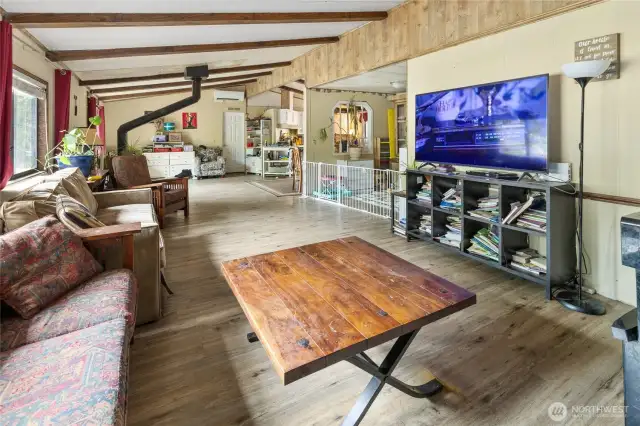 View from corner of great room, showing dining room and extra sitting space.