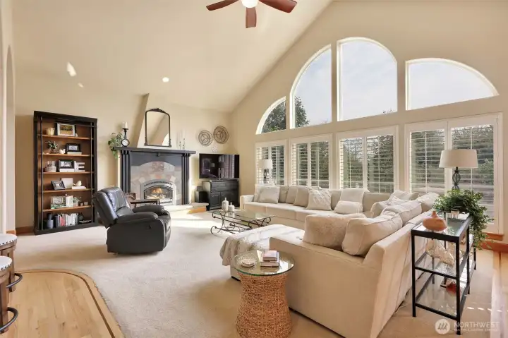 Cathedral Ceilings & Natural light from the Oversized Windows with Plantation window Coverings