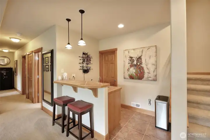 Basement Wet bar - hallway to rec Room and bedrooms