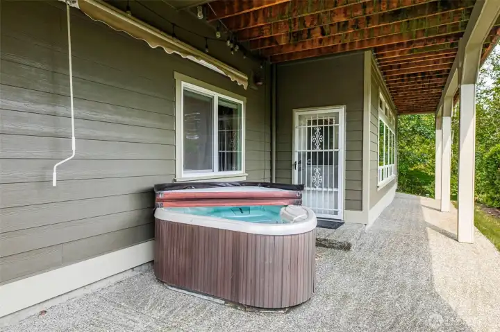 Hot tub with awning to cover for rainy winter soaks