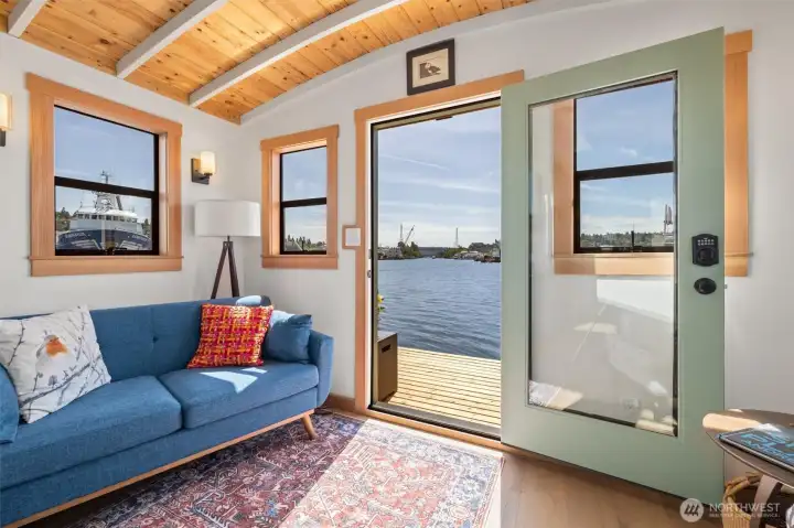 Entrance from front porch with Canal view and tasteful finishes, petina green accent to go with the Copper exterior
