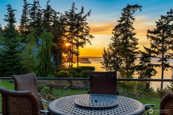 Evenings on the deck are framed by vibrant sunsets and the silhouette of evergreens against the water.  At night the ferries look like a cruise ship passing by.