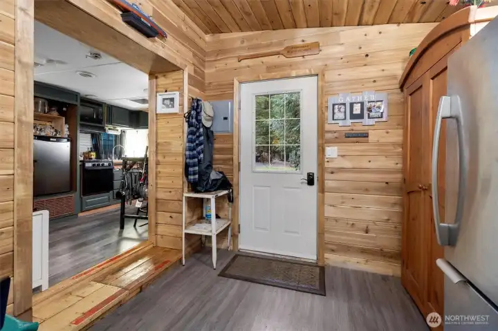 Full size fridge and pantry to the right.
