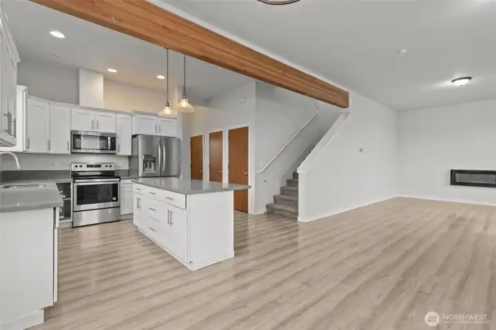 From Dining area looking at both the Kitchen and living area- you'll love how open and bright it is!