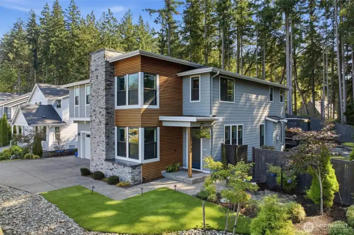 Stunning NW Contemporary inside and out!  Come live your dream home with exceptional grounds including a gated community located close to all amenities.