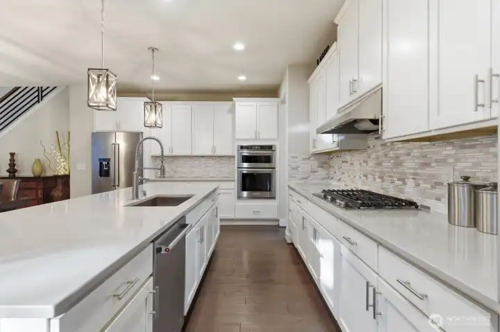 Stainless steel appliances, upscale materials and high-end finishes throughout.