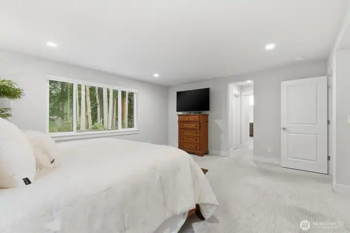 Primary bedroom with attached 5 piece bathroom and 2 walk-in closets.