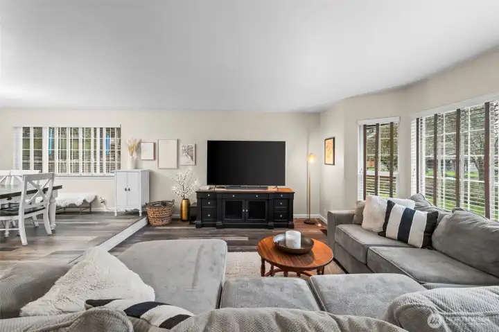 Tons of natural light in the living room and dining room.13911 113th Ave Ct E, Puyallup, WA 98374