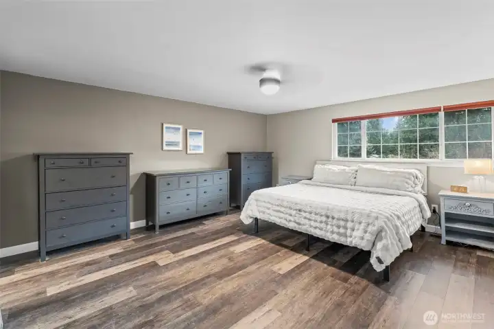 Spacious primary bedroom. 13911 113th Ave Ct E, Puyallup, WA 98374