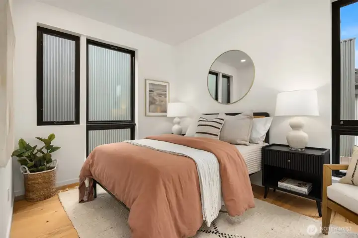 The second bedroom is not only the perfect sleeping space but also offers the flexibility to be utilized as an office, family room, or any other functional area to suit your lifestyle and needs.