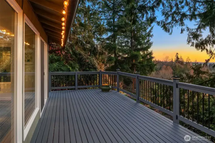 Spacious deck with gorgeous sunset and mountain views.