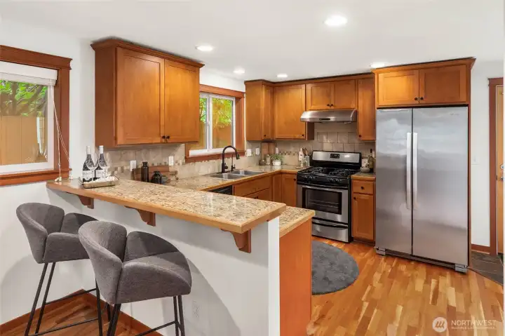 Large kitchen with breakfast bar is the heart of the home