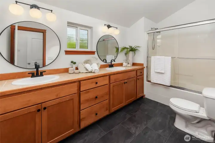 Huge primary bathroom with dual sinks