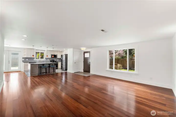 Step inside this one-story home featuring an open floor plan and stunning bamboo flooring!