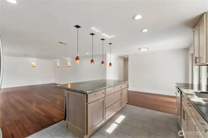 The island offers bar seating, pendant lighting and extra storage space for all your cooking gadgets.