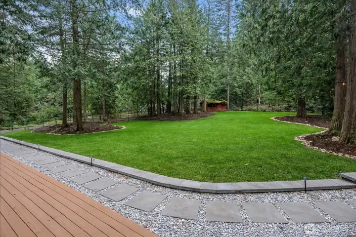 A true treasure in Mirrormont, this exceptional yard has been thoughtfully transformed into a private oasis, with the sellers investing over $30,000 in curated improvements. A true treasure in Mirrormont, this exceptional yard has been thoughtfully transformed into a private oasis, with the sellers investing over $30,000 in curated improvements.