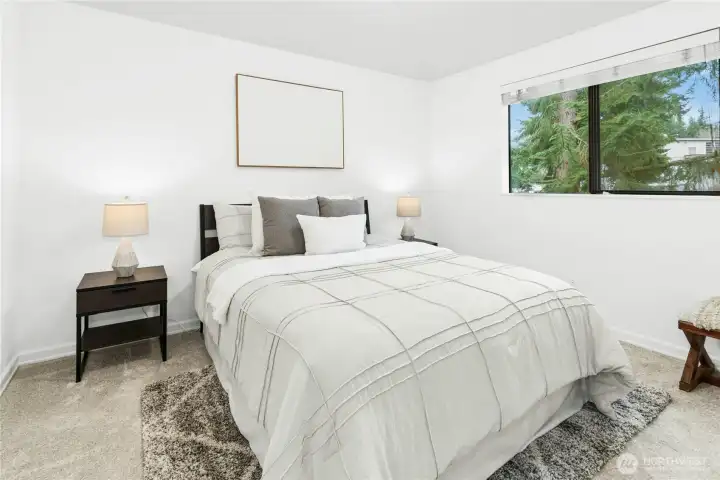 Large bedroom 2 - again a queen size bed and end tables fit well