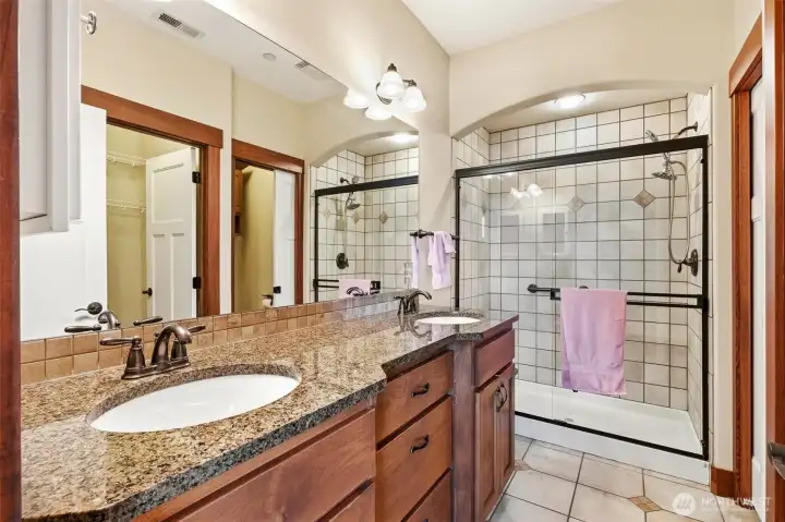 Primary Bathroom with walk-in closet