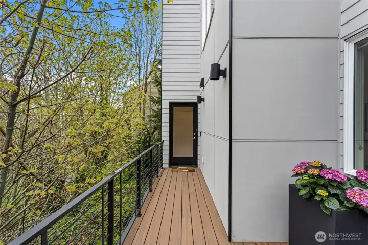 Live amongst the treetops in this private, beautifully crafted Magnolia townhome.