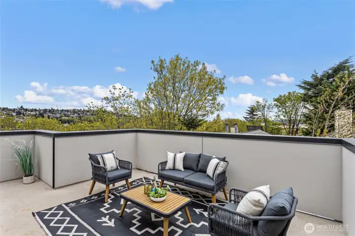 2nd rooftop deck boasts peek-a-boo views of Seattle and Puget Sound.