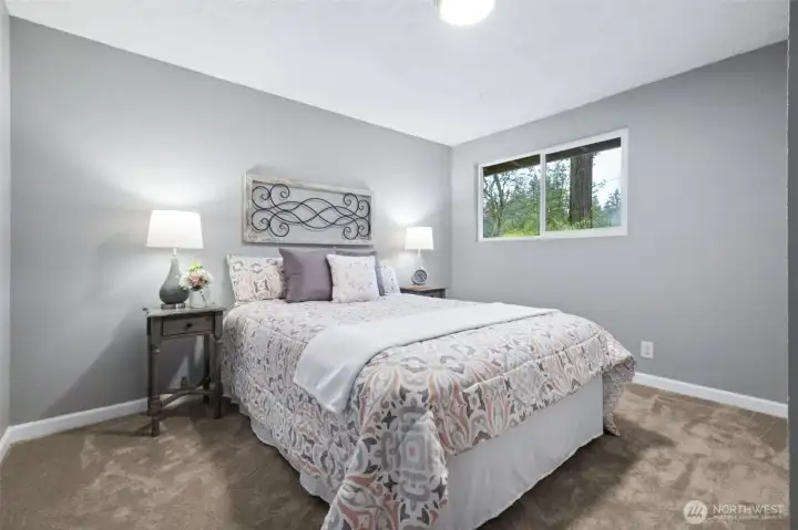 Spacious bedroom with neutral tones and great flexibility.