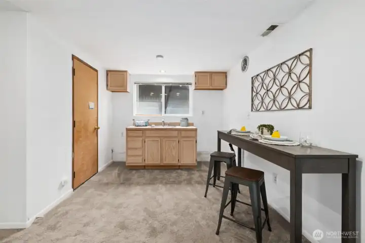 Utility or secondary kitchen area with added convenience and flexibility.