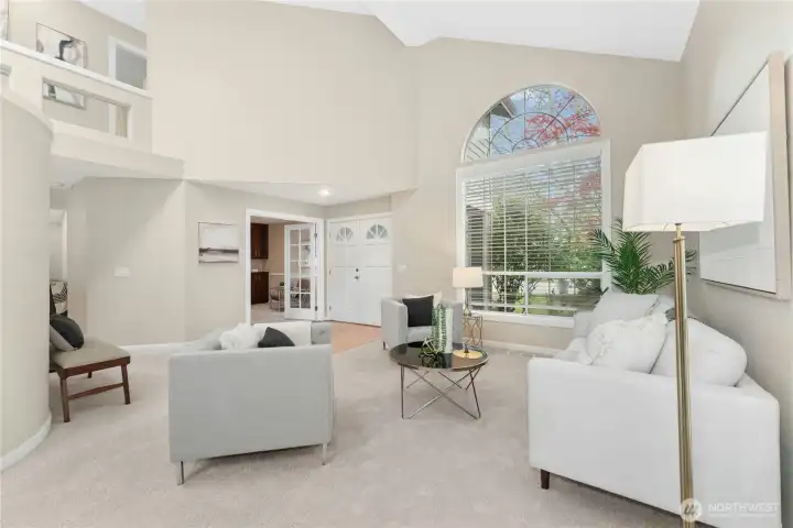 Grand living room offers oversized windows
