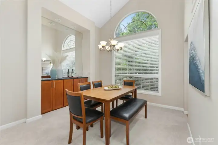 Formal Dining Room had built in buffet bar backed by a mirror + Large windows & Vaulted ceilings